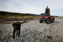 Greg Hope and his search dog Dave search the Haast Beach for Connor Hayes' body. Photo / Christine Cornege