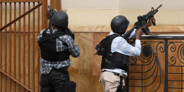 Armed special force aim their guns at the Westgate Mall in Nairobi. Photo / AP