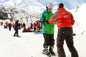 Skiers takes a lesson on opening day Turoa Skifield on Mount Ruapehu. Photo / Malcolm Pullman