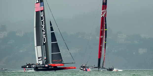 Emirates Team New Zealand and Oracle Team USA in the restart for race 13. Photo / Chris Cameron