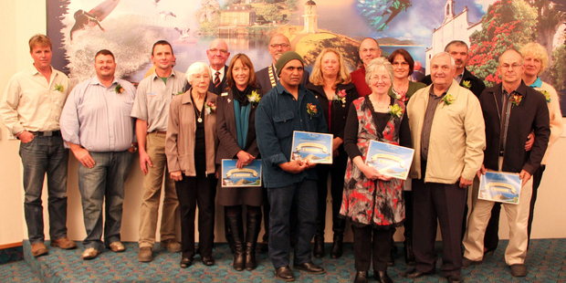 The recipients of the 2013 Citizen Awards with Mayor Wayne Brown, from left, Grant Harnish, Graham Wilson, Richard Duley, Fae Westgate, Peter Macauley, Judy Hyland, Daniel and Elizabeth Kaiawe, Ken Timperley, Lauren Barclay, Nada Jurlina, Les Barclay, Dave Jurlina, Mike and Janet Fleming. John Horrell will receive his award at a later date.