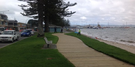 Police at Pilot Bay where a body has been found.