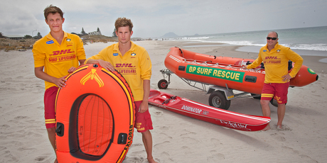Papamoa Surf Lifesaving Club lifeguards Sam Casey (left) and Hamish Smith were surprised when they were called to rescue two men in a small inflatable boat exactly like the one pictured. Photo / Stephen Parker