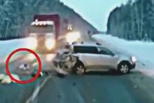 An image from the moment a truck headed towards a baby lying in the middle of a motorway following a crash. Photo / Supplied/ YouTube 