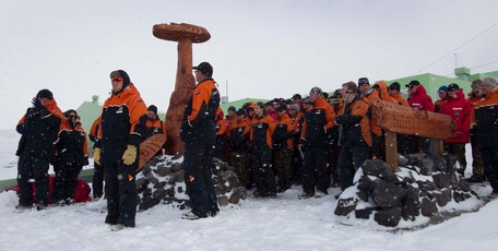 Prime Minister John Key unveils the new maori statue and sign in front of Scott Base in Antarctica today. Photo / Alan Gibson