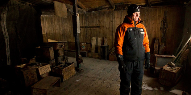 Scott Base hut guide Anthea Fisher inside the 110-year-old Discovery Hut, which is to be restored to conserve it and its contents as left by explorer Robert Scott. Photo / Alan Gibson