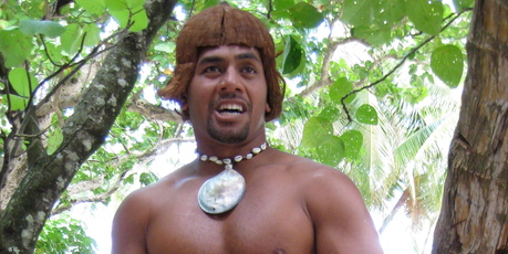 Papa, from the outer island of Pukapuka, displayed his coconut-tree climbing prowess. Photo / Peter Calder