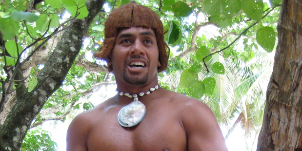 Papa, from the outer island of Pukapuka, displayed his coconut-tree climbing prowess. Photo / Peter Calder