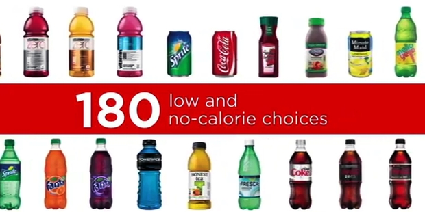 This screenshot of a Coca-Cola advertisement points to the company's record of providing soft drinks with fewer calories. Photo / AP