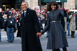 President Barack Obama and first lady Michelle Obama walk down Pennsylvania Avenue in Washington. Photo / AP