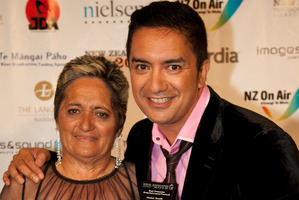 Matai Smith, pictured with his mother Honey Smith, after he won the prize for best presenter at the New Zealand Television Awards. Photo / Neville Marriner