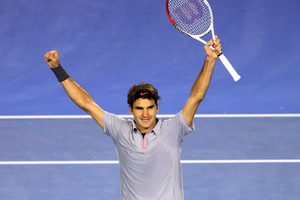 Roger Federer celebrates winning his Quarterfinal match against Jo-Wilfred Tsonga . Photo / Getty Images