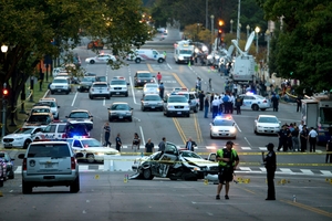 AFTERMATH: Former Napier man Matt Jacobs (top left) became an overnight celebrity when he biked shirtless after a motorist who rammed a police car (pictured) outside the White House in Capitol Hill. The motorist was later shot dead by police. PHOTO/AP