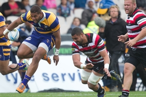 Steamers winger Tino Nemani skips out of a weak tackle from a Counties Manukau player.