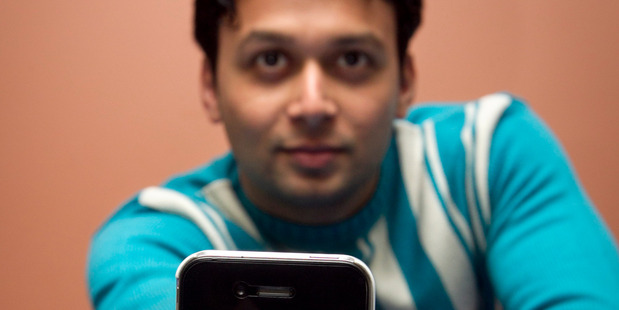 Nameet Patil has bought a new smartphone after he found his old Android one was hacked. Photo / Natalie Slade Photo / Natalie Slade