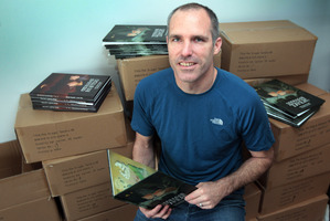 James Russell published his own children's book, The Dragon Hunters. Photo / Doug Sherring