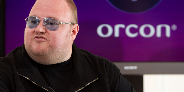 Kim Dotcom at a press conference with Orcon CEO Greg McAlister. Photo / NZ Herald