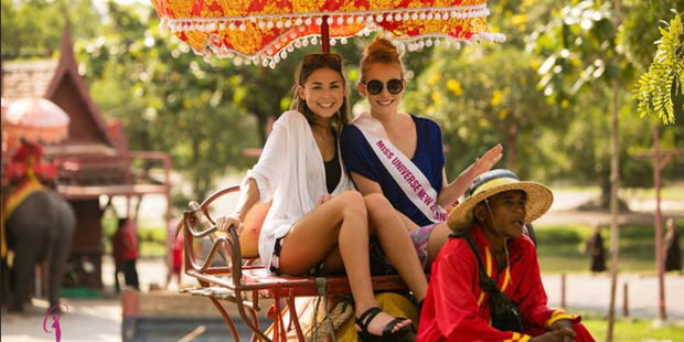 Sophie Hopes (left), daughter of Paul Henry, with fellow Miss Universe NZ contestant Mariah Te Whana in Thailand.