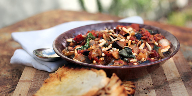 Toasted pine nuts and basil are the finishing touches for Grant's Caponata. Photo / Doug Sherring