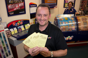 Gary Ashton, owner of One Step Ahead, the shop in Three Lamps, Ponsonby which sold the winning $33 million Lotto Powerball ticket. Photo / Herald on Sunday / Steven McNicholl