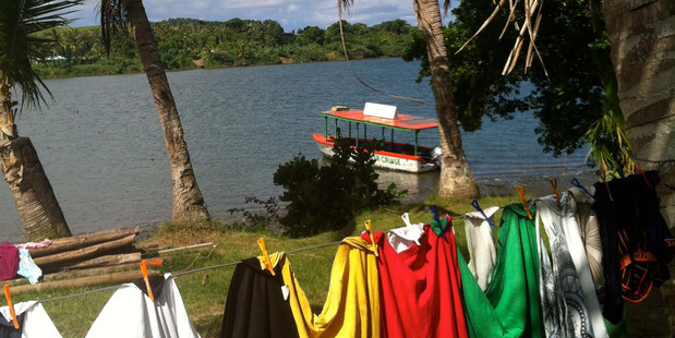 A Fiji river cruise is a colourful experience.
