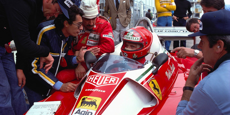 Niki Lauda talks to his manager and crew during a pitstop moments before the fiery crash that almost killed him at Nurburgring on August 1, 1976. Photo / Getty Images