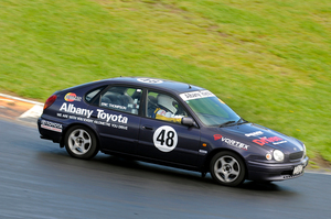 Eric Thompson racing the Driven Albany Toyota Corolla in the 2K Cup at Hampton Downs. Picture / Geoff Ridder