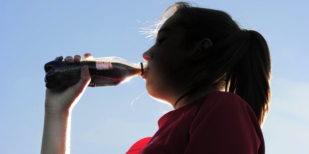 A tax on fizzy drinks could help combat teenage obesity.