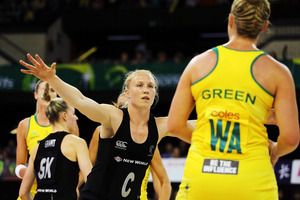 Laura Langman of New Zealand defends against Kimberlee Green of Australia. Photo / Getty