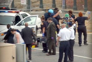 Capitol Hill police and medics take a shooting victim away on a stretcher. Photo / AFP