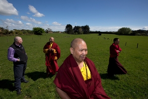 Resident monk Lama Karma Dorjey (front) and (left to right) Michael Barraclough, Abbot Choje Lama Shedrup and Karma Gyelgshen. Picture / Brett Phibbs