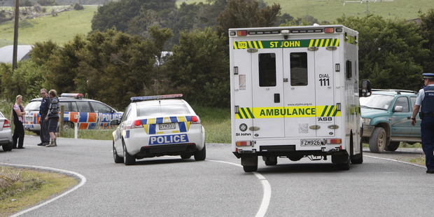 Emergency services gather on the corner of Whatmough Rd and Whananaki North Rd. Photo / APN