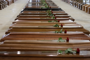 Coffins for some of the 111 bodies recovered so far. Photo / AP