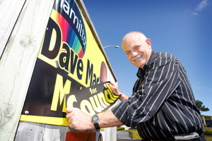 Dave Macpherson plasters over his signs 'Dave Mac for Mayor' with 'Dave Mac for Council' now he is asking supporters to vote for one of his rivals in the mayoralty. Photo / APN
