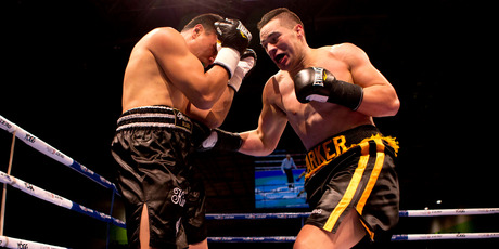 Joseph Parker (Yellow) in action during his fight with Afa Tatupu. Photo / Dean Purcell