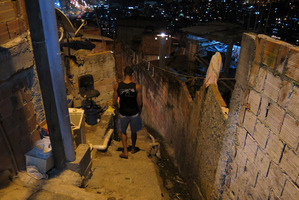 Anderson de Souza near his home in the Rocinha slum, in Rio de Janeiro, Brazil. De Souza's father disappeared in July after last being seen in police custody. Photo / AP