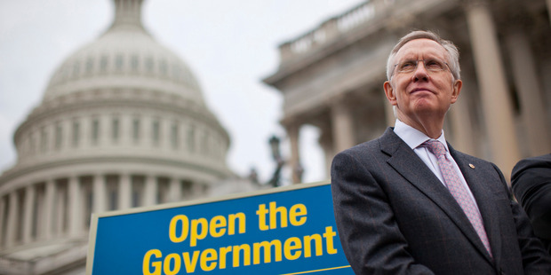 Senate Majority Leader Harry Reid stands on the Senate steps on Capitol Hill in Washington during a news conference on the ongoing budget battle. Photo / AP