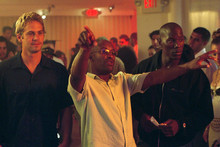 Paul Walker and Tyrese Gibson with '2 Fast 2 Furious' director John Singleton (centre).