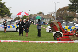 A blessing is given at Kirkpatrick Park, Hastings, where a four year-old boy died after playing near a Hastings District Council tractor and lawn-mower. Photo / Duncan Brown