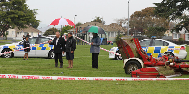 A blessing is given at Kirkpatrick Park, Hastings, where a four year-old boy died after playing near a Hastings District Council tractor and lawn-mower. Photo / Duncan Brown
