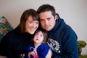 Parents Rachel and Sam Callander with Evie, who had chromosomal and genetic disorders and died aged 2.