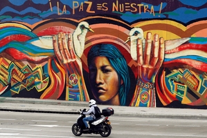 Tourism is on the rise in Colombia but so is the influence of the gangs that control many of the country's slums. Photo / AP