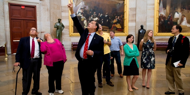 Senator John Boozman leads a Capitol tour in place of staffers and interns who have been stood down. Photo / AP