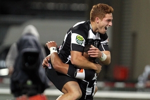 Ihaia West celebrates his match-winning try with Telusa Veainu in last night's upset victory over the Wellington Lions at McLean Park, Napier.