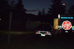 The scene of a police investigation last night after a body was discovered in a Cromwell caravan. Photo / ODT