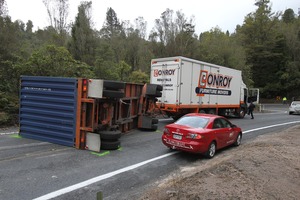Crash. A truck heading towards Tauranga lost control of his trailor in the gorge on Pyes Pa Rd Photo by John Borren
