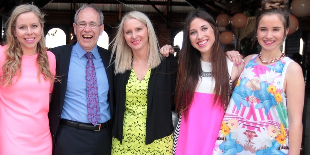 Len Brown celebrating his re-election on Saturday with his wife Shan Inglis and daughters Sam Colgan, Olivia Brown and Victoria Brown. Photo / APN