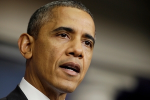 President Barack Obama announces this week that America is open again ... but disaster was only narrowly avoided. Photo / AP