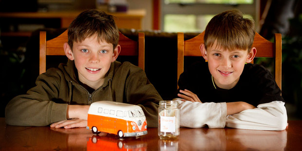 11-year-old twins Josh (left) and Cameron Stokes have a week in which to decide how to spend their pocket money. Photo / Christine Cornege