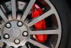 Alloy Wheel With A Red Brake Caliper Photo / Thinkstock